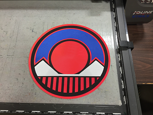 Picture of multi-color kisscut twill design on flatbed cutter