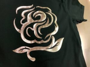picture of balck shirt with rose design in the Siser 'Golden Rose' Metal heat transfer vinyl